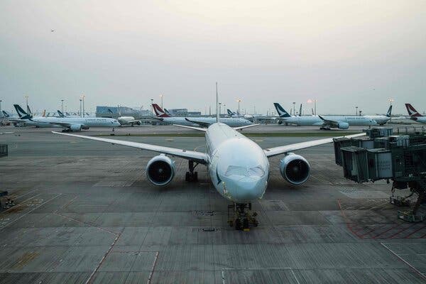 Cathay Pacific slashes 8,500 jobs as it struggles with the pandemic and politics.